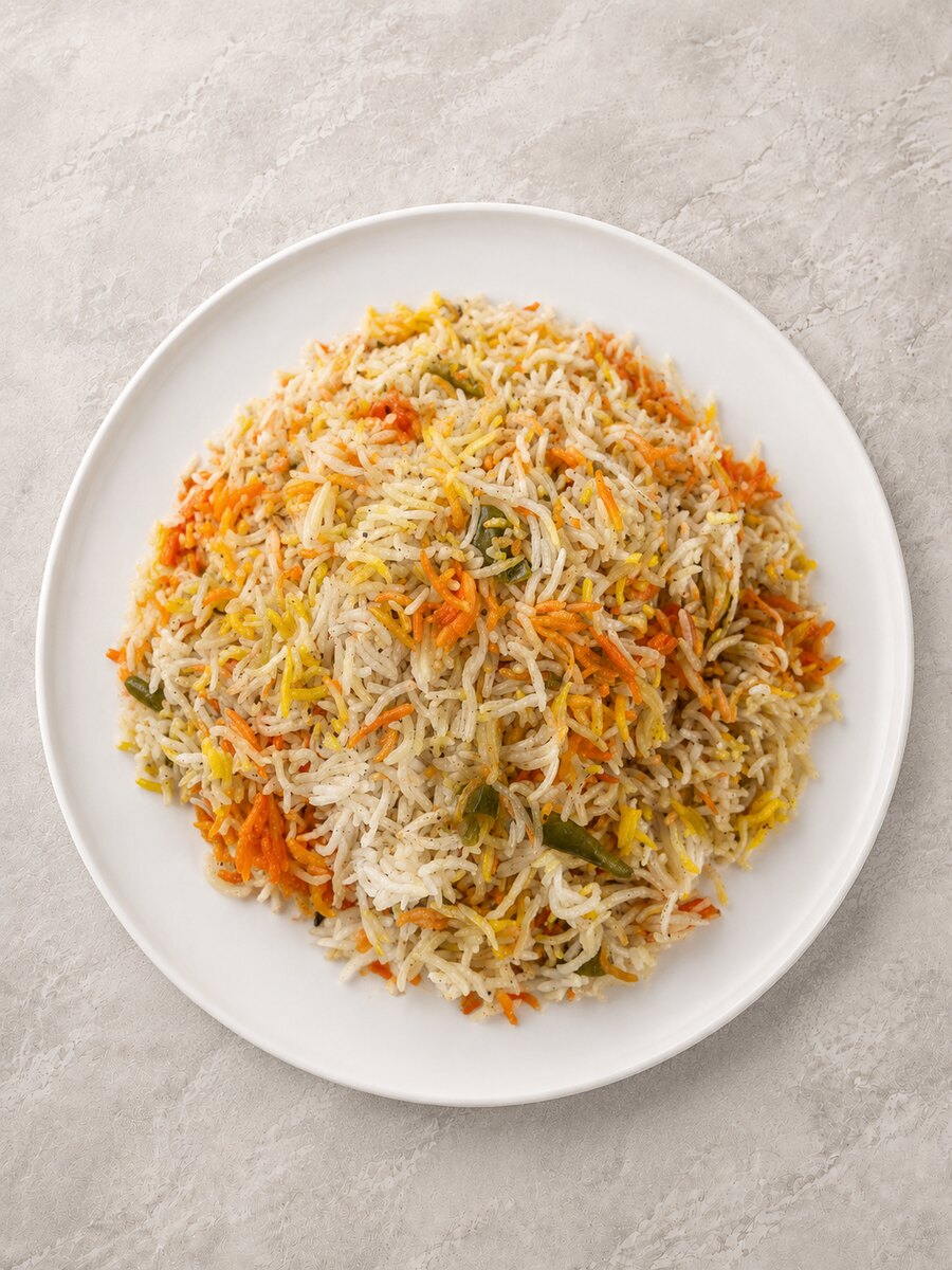 Fragrant spiced rice on a white plate