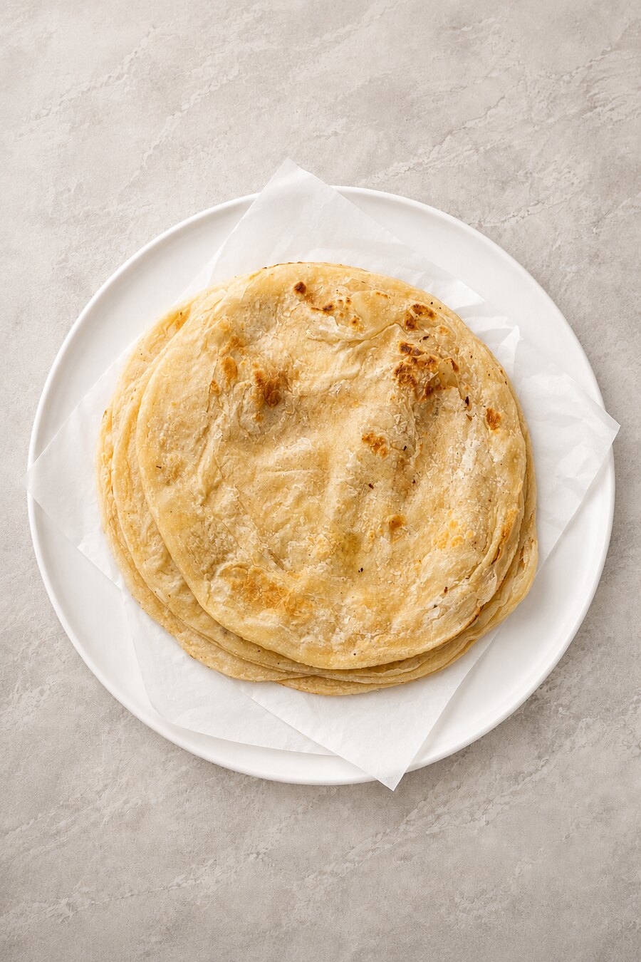 Stack of freshly cooked layered flatbreads