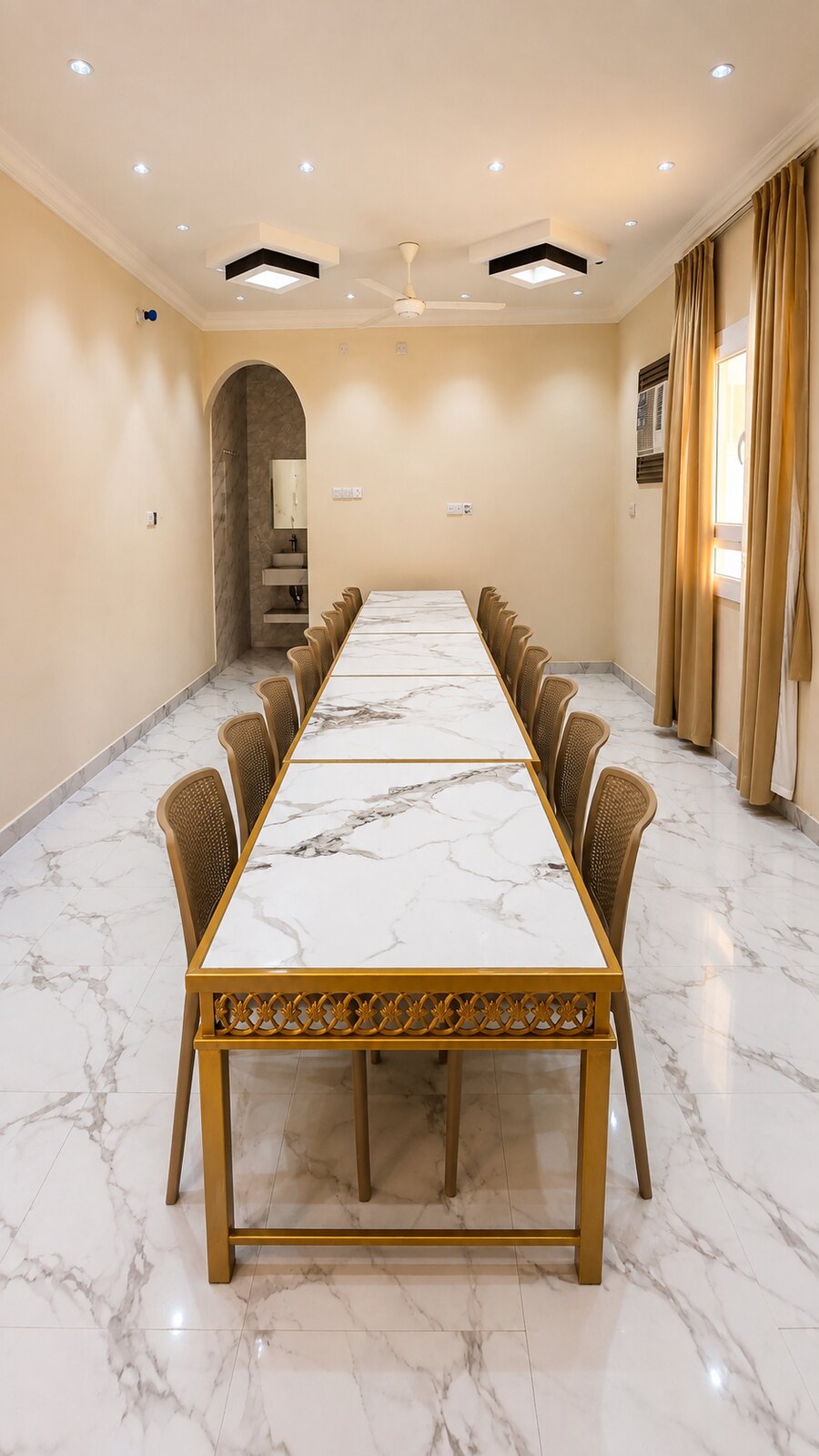 Bright indoor dining room with long marble tables