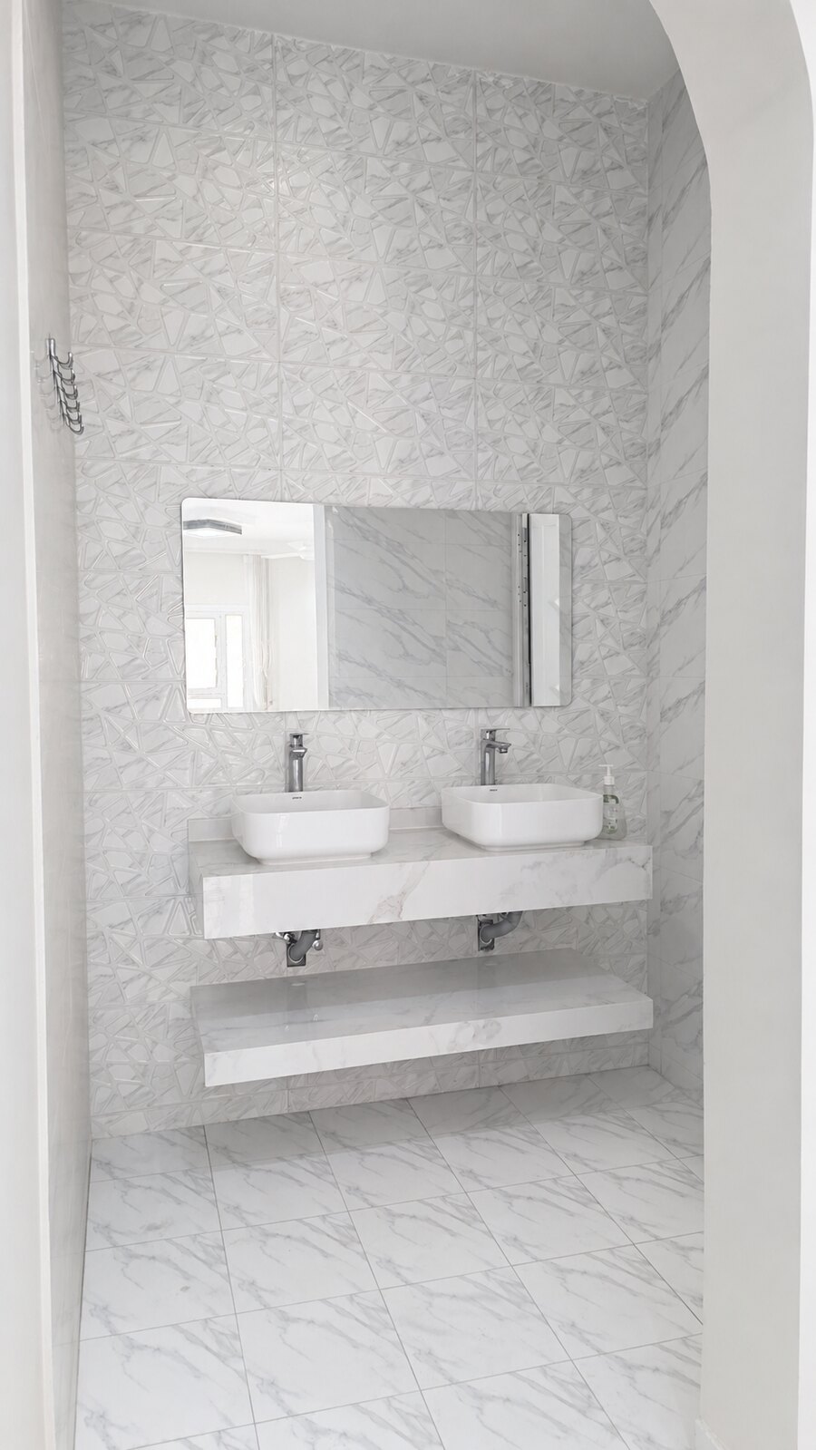 Bright guest wash area with two basins